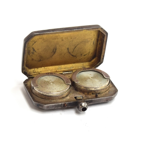 140 - A silver double sovereign case, by William Hair Haseler, Birmingham 1913, of canted rectangular form... 