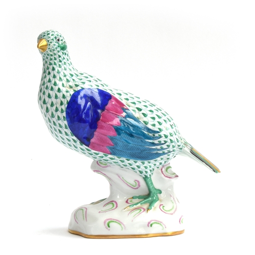 244 - A Herend porcelain partridge, green fishnet pattern, marked to base, 23cm high