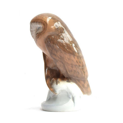 240 - A Royal Copenhagen porcelain barn owl, number 273, marked to base, 22cm high