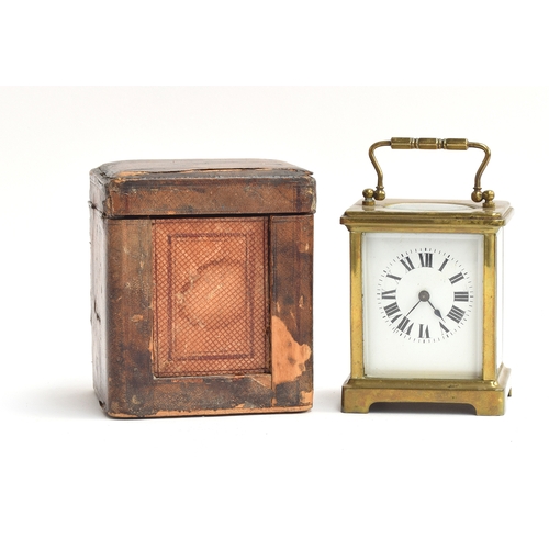 48 - An early 20th century French brass carriage clock, bevelled glass panels, enamel dial with Roman num... 