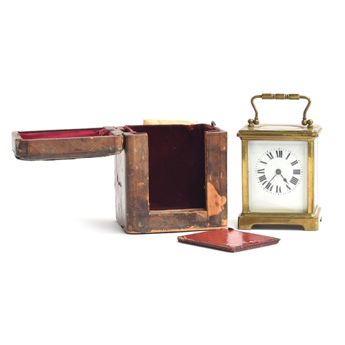 48 - An early 20th century French brass carriage clock, bevelled glass panels, enamel dial with Roman num... 