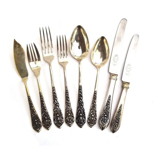 60 - An .835 silver dinner service, marked 'PK 0835', for 12 place settings, comprising table forks (12),... 