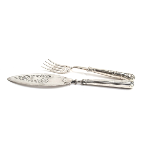 66 - A George III silver fish slice, by William Plummer, London 1784 (the handle marked TM), the floral p... 