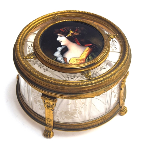 163 - A French circular ormolu mounted crystal casket, the lid with hand painted enamel plaque depicting a... 