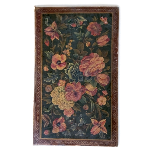 318 - A Persian Qajar lacquer binding panel, polychrome floral design, 23x14cm, in a parquetry frame, labe... 