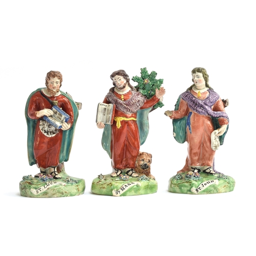 230 - Three Staffordshire Pearlware figures of saints (af), St. Luke, 18.5cm high, St. Mark, 18.5cm high, ... 