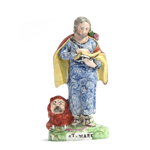 231 - A Staffordshire pearlware figure of St. Mark (af), marked 'Salt' to reverse, 20cm high