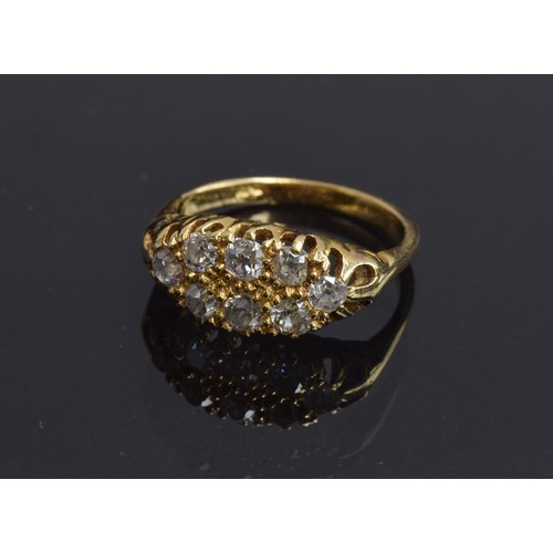 1 - An 18ct gold boat shaped ring set with eight diamonds, in openwork setting, size M, approx. 4.4g