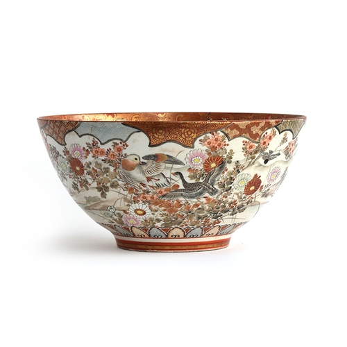 217 - A 19th century Japanese Satsuma punch bowl, the interior depicting women and children flying a kite ... 