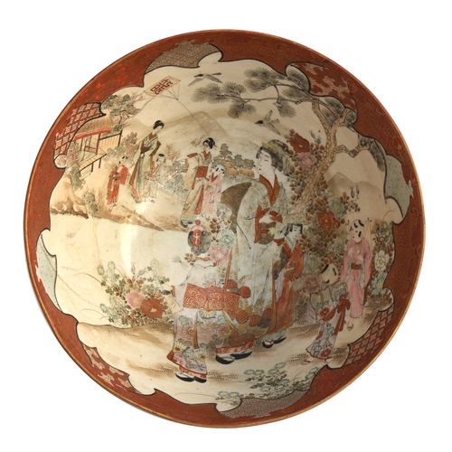 217 - A 19th century Japanese Satsuma punch bowl, the interior depicting women and children flying a kite ... 