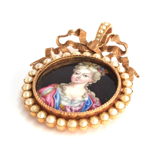 21 - A 19th century enamel portrait miniature pendant, possibly Marie Antoinette, the portrait in a yello... 