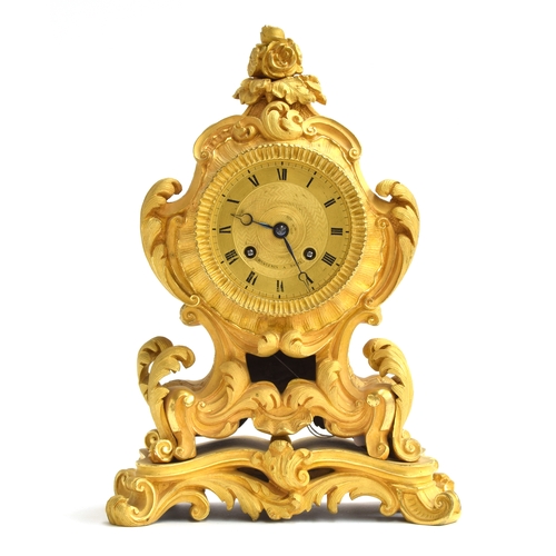 55 - A 19th century French Ormolu mantel clock, the gilt dial with Roman Numerals signed 'Huguenin A Pari... 