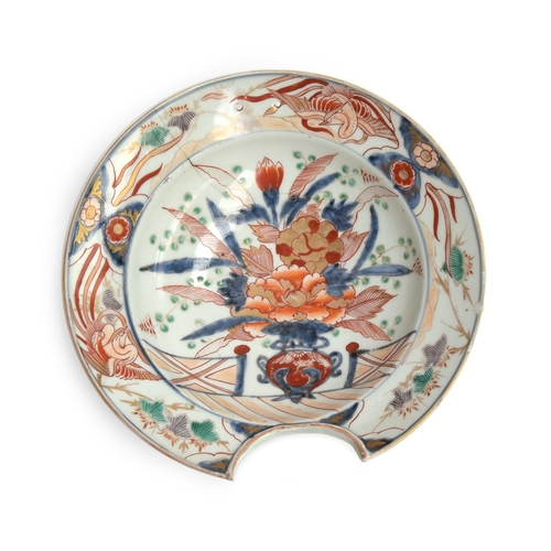 218 - A 19th century Japanese Imari shaving bowl, with central floral urn decoration, heightened in gilt, ... 