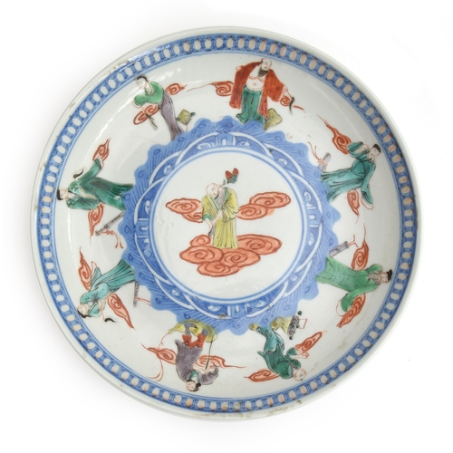 216 - A Chinese famille verte plate depicting immortals, Kangxi mark to base, 18cm diameter