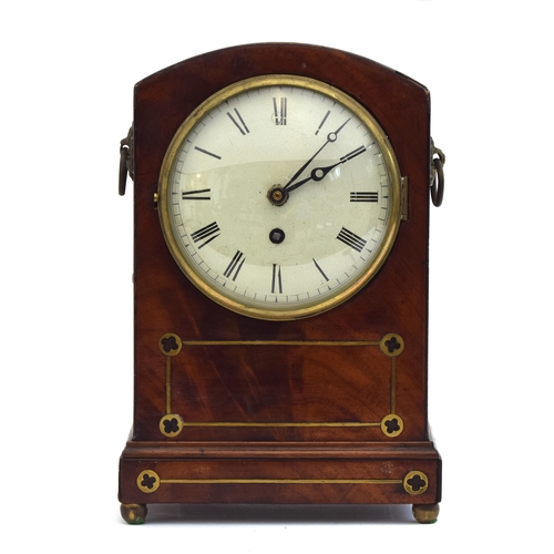 53 - A mahogany and brass inlaid mantel clock, Roman numerals to white enamel dial, on brass ball feet, 3... 