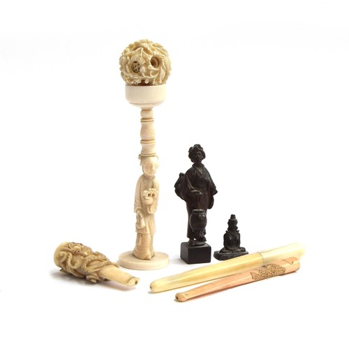 197 - A collection of ivory items to include carved Chinese puzzle ball with stand in the form of a lady, ... 