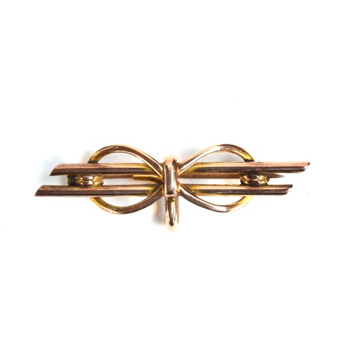 19 - A yellow metal brooch in the form of a bow, 4cm wide, 2.9g