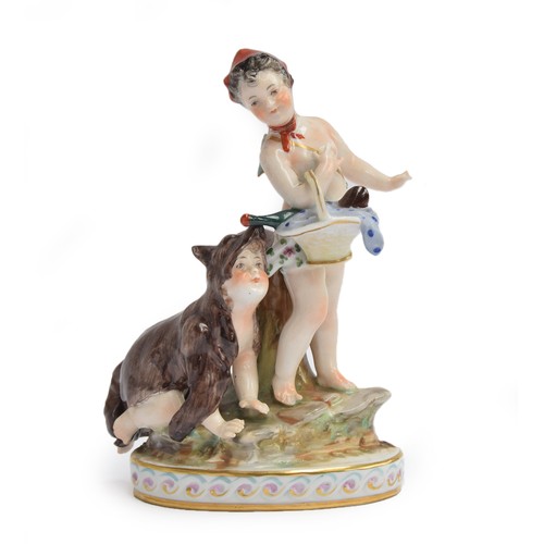 239 - An 18th century Capo di Monte porcelain figure group depicting putti (af), one crawling in a wolfski... 