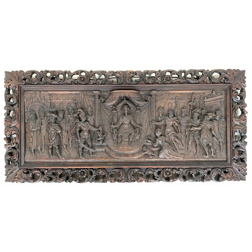 622 - A Flemish carved panel with pierced border, 95cm wide, 44cm deep