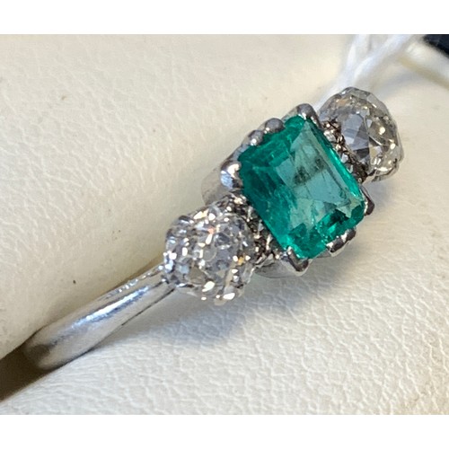 31A - A platinum set emerald and diamond ring, the emerald approx. 5mm x 6mm, size N 1/2, approx. 3.7g