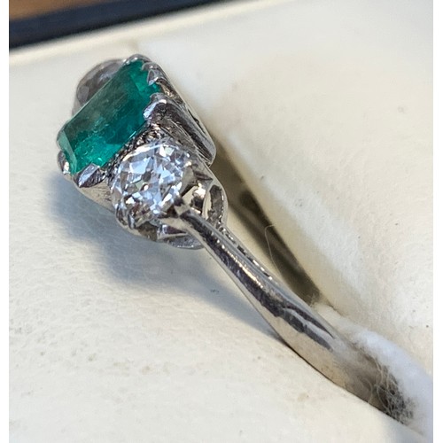 31A - A platinum set emerald and diamond ring, the emerald approx. 5mm x 6mm, size N 1/2, approx. 3.7g