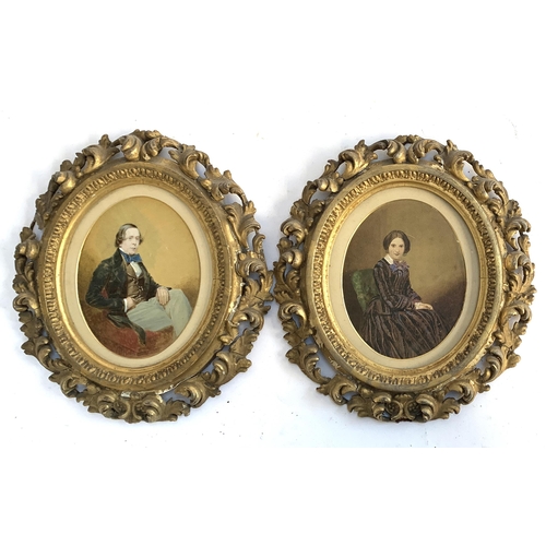 349A - A pair of early 19th century portraits of a lady and gent, three-quarter length seated, watercolour ... 