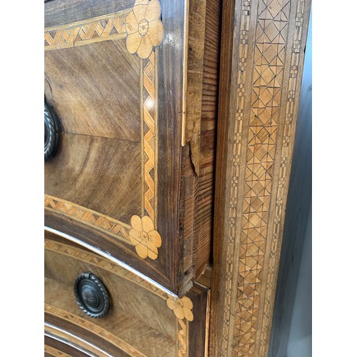 533 - A probably Spanish serpentine fronted chest of four drawers, all over marquetry and parquetry decora... 