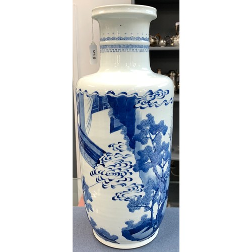 215 - A blue and white Chinese rouleau vase, depicting court scenes and a landscape amidst swirling clouds... 