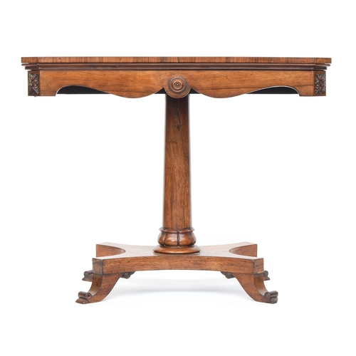 608 - A Regency rosewood card table, fold over top, over a shaped apron, gun barrel column on a quatrefoil... 