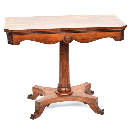 608 - A Regency rosewood card table, fold over top, over a shaped apron, gun barrel column on a quatrefoil... 