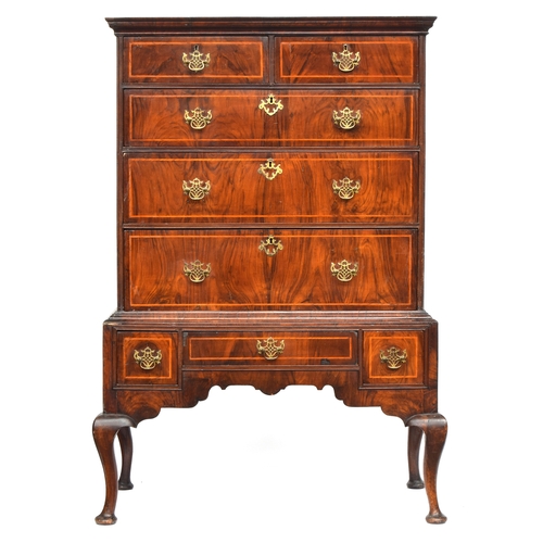 591 - A George I walnut chest on stand, moulded pediment over two short and three long drawers, the base o... 