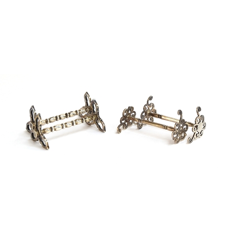 131 - Two pairs of silver knife rests, by William Hutton & Sons, Sheffield 1912 and 1916