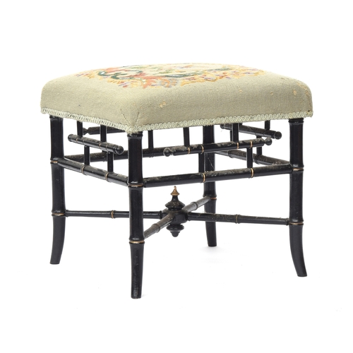 664 - An ebonised and parcel gilt faux bamboo stool in the Chinese Chippendale style, with bird of paradis... 