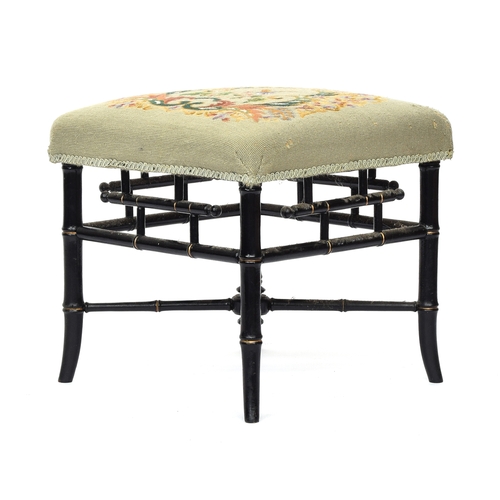 664 - An ebonised and parcel gilt faux bamboo stool in the Chinese Chippendale style, with bird of paradis... 