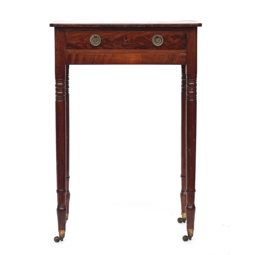 631 - A 19th century mahogany occasional table, single drawer over slide, on turned legs with brass caps a... 