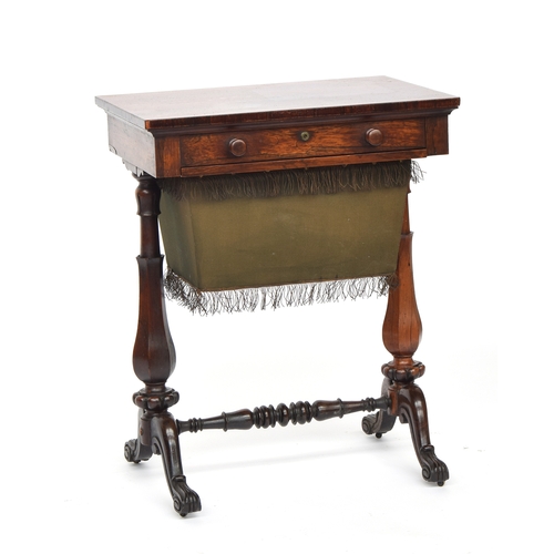 625 - A Victorian rosewood work table, single drawer with pull out workbox below, on faceted supports and ... 