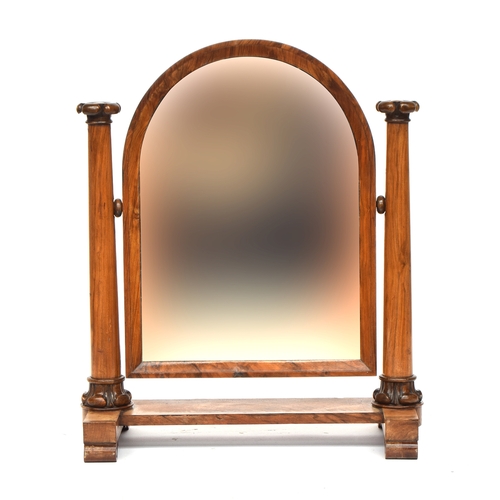 685 - A Victorian domed adjustable dressing mirror, on two carved tapering supports, 61cm wide, 74cm high