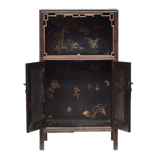 642 - A black Japanned bamboo cabinet, decorated all over with cranes, peacocks, foliage, etc, 60x44x110cm