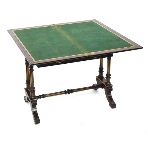 610 - A Victorian Aesthetic movement card table by Gillows of Lancaster, c.1880, amboyna, ebonised and par... 