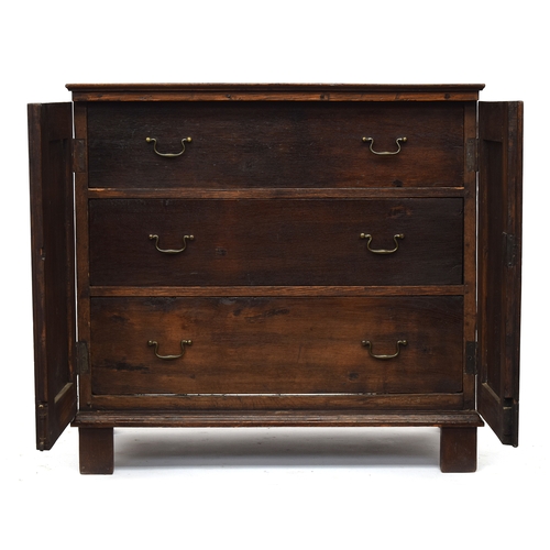 586 - A late 17th century oak chest, the linenfold doors opening to three drawers, 95cm wide, 63cm deep, 9... 