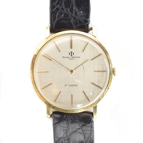 84 - A Baume & Mercier Baumatic 18ct gold gent's wrist watch, textured dial with baton markers, 34mm diam... 