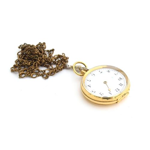 66 - A small 18ct gold open face fob watch, Arabic numerals to white enamel dial, on a yellow metal chain