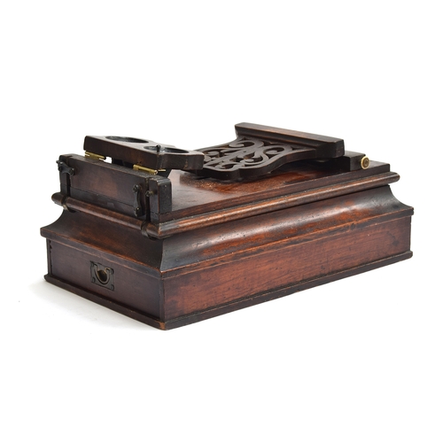 211 - A late Victorian mahogany stereoscope, in the manner of Newton & Co., the upper half with fold down ... 