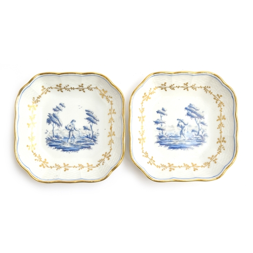 289 - Two Richard Ginori pin dishes with hand painted pastoral scenes, heightened in gilt, each 11.5cm dia... 