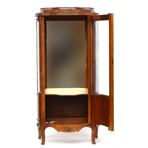 638 - A Louis XV style kingwood display cabinet, ormolu mounted, with shaped door, floral marquetry, on ca... 