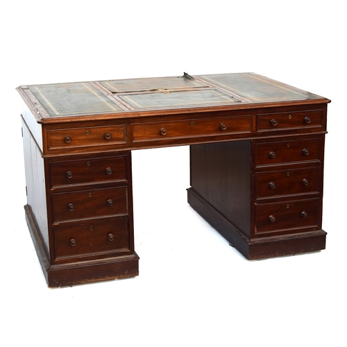 643 - A Victorian mahogany partner's desk, having four inset skivers, each side with adjustable writing sl... 