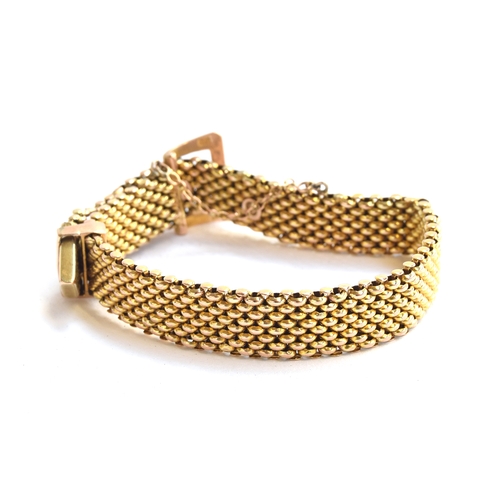 60 - A 9ct gold mesh buckle bracelet, approx. 20.4g