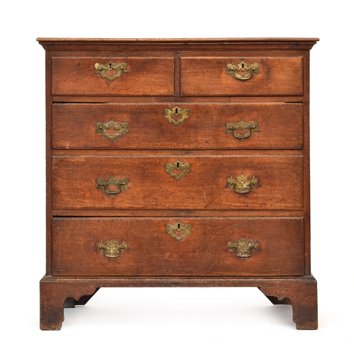 593 - A George II oak chest of drawers, the moulded top above two short and three graduating drawers with ... 