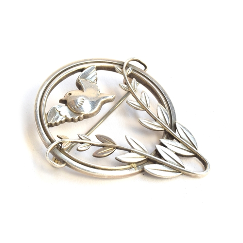 27 - A Georg Jensen sterling silver brooch, songbird in foliage, designed by Arno Malinowski, no. 258, 4.... 