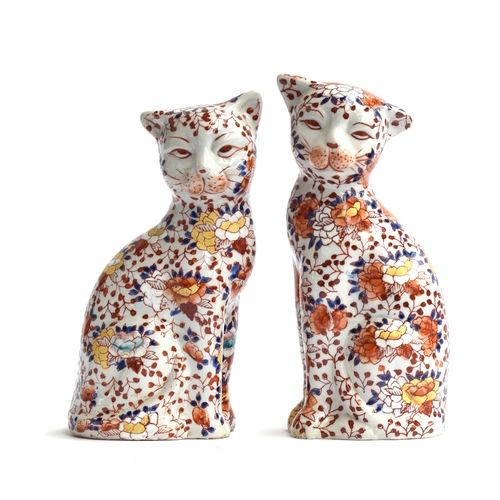 259A - A pair of early 20th century Chinese imari style cat figurines by YaYou Zhen Cang, each signed to ba... 